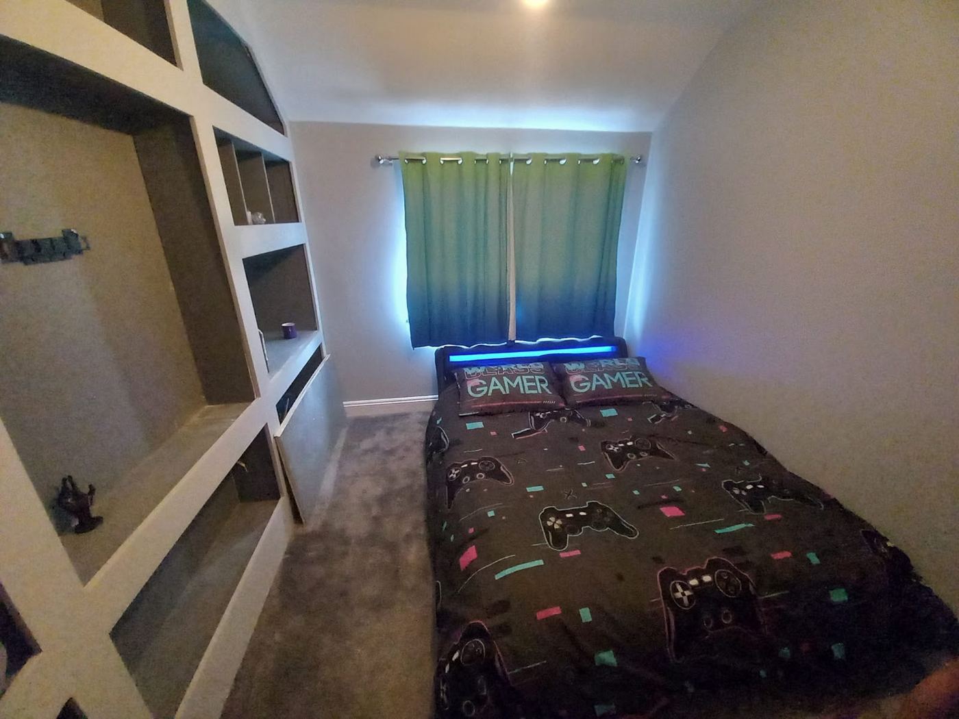 Bedroom with fitted storage and shelving